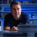 Matteo Pasquali wearing a Rice University polo in a blue-lit workshop setting.